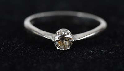 Lot 464 - An 18ct white gold diamond solitaire ring, the...