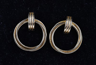 Lot 196 - A pair of yellow metal rope twist hoop...