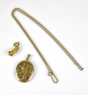 Lot 320 - A 9ct yellow gold oval locket, suspended on a...