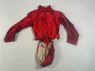 Lot 366 - A 19th century velvet bodice, some buttons...