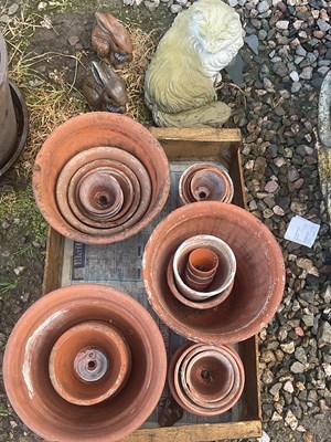 Lot 816 - A quantity of terracotta plant pots of various...