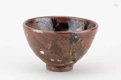 Lot 239 - JAKE VINSON; a stoneware bowl covered in iron...