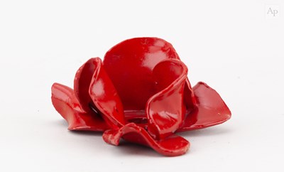 Lot 434 - PAUL CUMMINS; a ceramic poppy from the art...