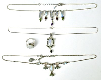 Lot 812 - Three silver and moonstone necklaces,...