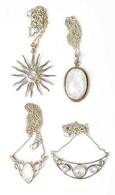Lot 813 - Four silver and white metal and moonstone...