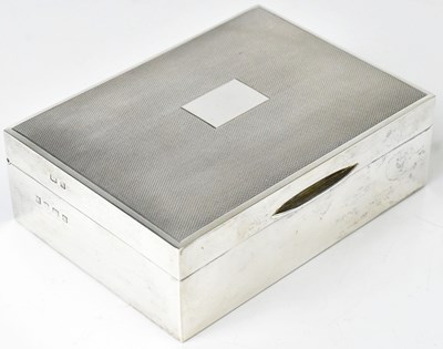 Lot 587 - An Elizabeth II silver cigarette box of...