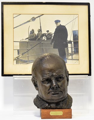 Lot 498 - A resin bust of Churchill on a wooden plinth...