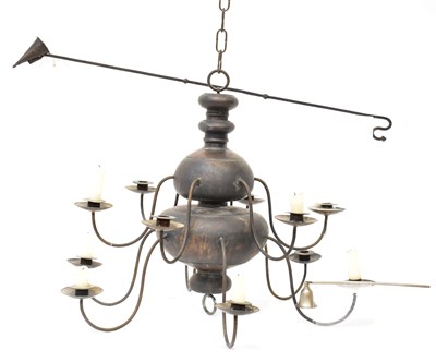 Lot 93 - A 17th century style brass twelve-branch...