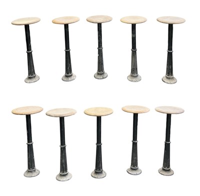 Lot 26 - A set of ten modern cast iron bar stools, with...