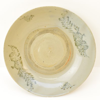 Lot 1040 - A large Ming dynasty Zhangzhou pottery bowl,...