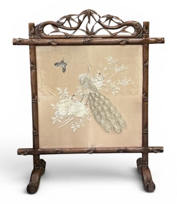 Lot 21 - A late 19th/early 20th century Chinese carved...