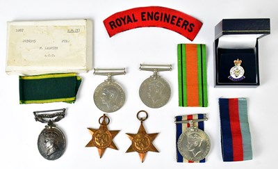 Lot 496 - A WWII medal group comprising the War Medal...