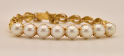 Lot 1497 - A Chinese yellow metal fancy link bracelet set...