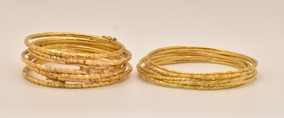 Lot 1482 - Fourteen 22K gold and yellow metal Chinese...