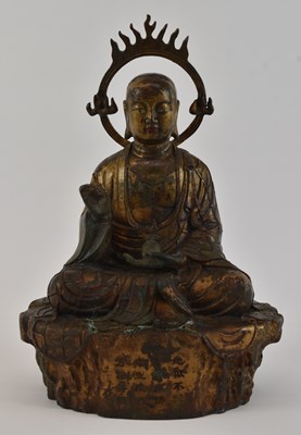 Lot 1005 - An 18th/19th century Chinese gilt metal figure...