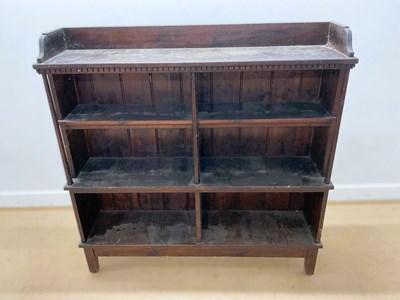 Lot 682 - A 20th century mahogany three tier bookshelf,...