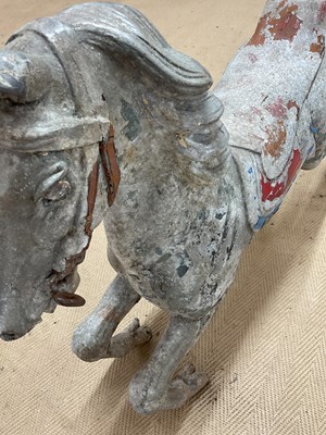 Lot 12 - A large cast metal carousel horse, height 72cm,...