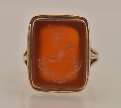 Lot 1311 - A 19th century yellow metal intaglio set...