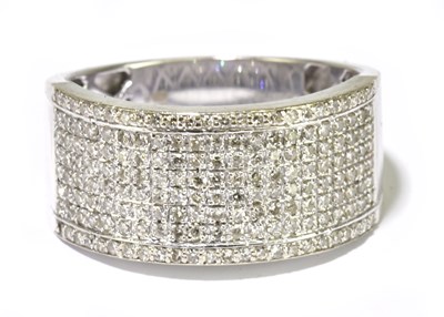 Lot 41 - A large 18ct white gold pave diamond set ring,...