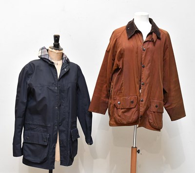 Lot 1324 - BARBOUR; a navy blue gentleman's waterproof...