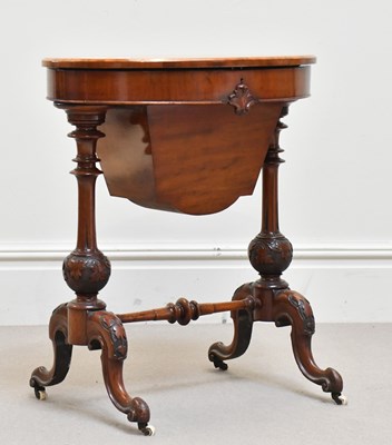 Lot 2032 - A 19th century walnut sewing table, with...