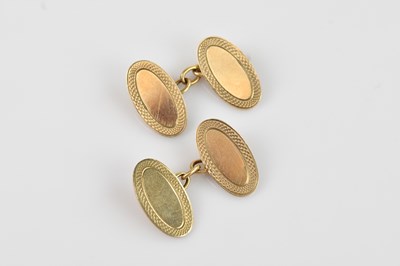 Lot 262 - A pair of 9ct yellow gold cufflinks, with...