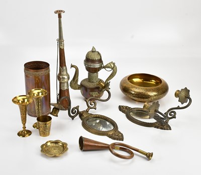 Lot 591 - A collection of eastern metalware including...