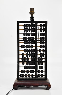 Lot 581 - A vintage decorative Abacus table lamp, height...
