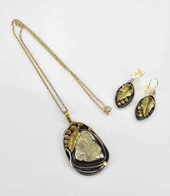 Lot 324 - A Russian yellow and white sterling silver...