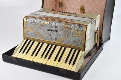 Lot 31 - SCARLATTI; a cased piano accordion.