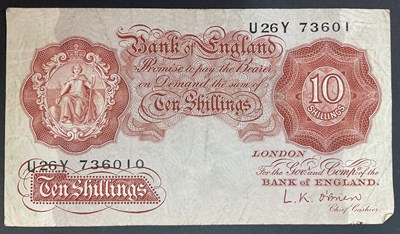 Lot 407 - A ten shilling bank note signed by L K O'Brien...