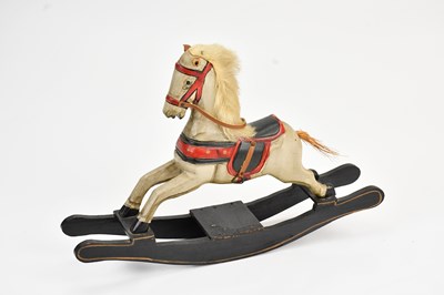 Lot 2074 - A hand carved black and white painted model...