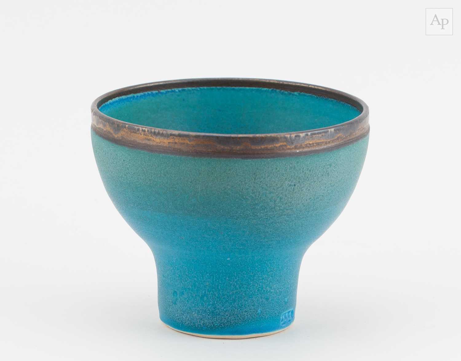 Lot 1 - ABDO NAGI (1941-2001); a porcelain cup covered...