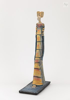 Lot 633 - A tall earthenware sculpture of a standing...