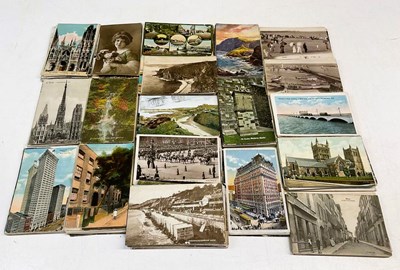 Lot 475 - A small quantity of postcards, many with...