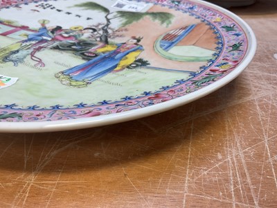 Lot 255 - A pair Chinese famille rose plates, decorated...