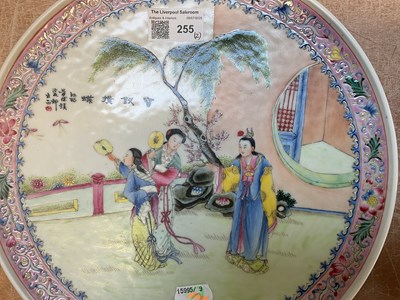 Lot 255 - A pair Chinese famille rose plates, decorated...
