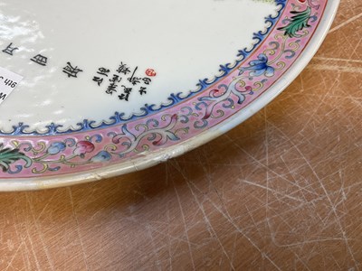Lot 255 - A pair Chinese famille rose plates, decorated...