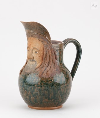 Lot 269 - JIM RANSON; a stoneware character jug of the...