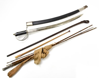 Lot 2545 - An Indian curved sword, a carved walking cane,...