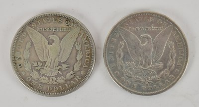 Lot 1593 - An 1889 New Orleans Morgan silver dollar and...