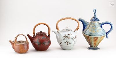 Lot 644 - A group of stoneware teapots by Andrew Osborne,...