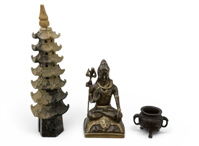 Lot 1037 - A modern Indian bronzed figure of seated Shiva,...