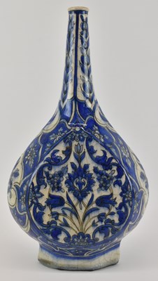 Lot 1023 - A late 19th/early 20th century earthenware tin...
