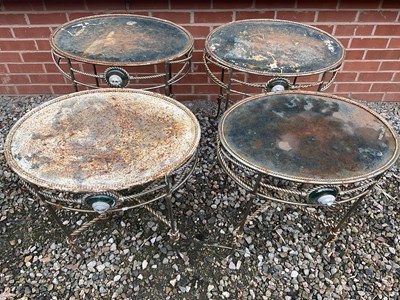 Lot 891 - Four oval garden tables, with metal legs and...