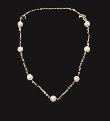 Lot 693 - A 9ct yellow gold seed pearl set fine link...