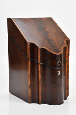 Lot 424 - A 19th century inlaid mahogany serpentine...