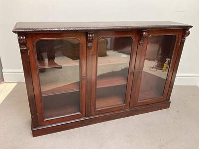Lot 182 - A Victorian style carved walnut display...