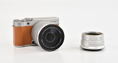 Lot 90 - FUJIFILM; a X-A10 digital camera, with a...