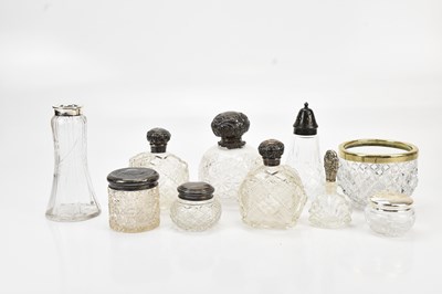 Lot 1211 - A collection of cut glass dressing table items,...